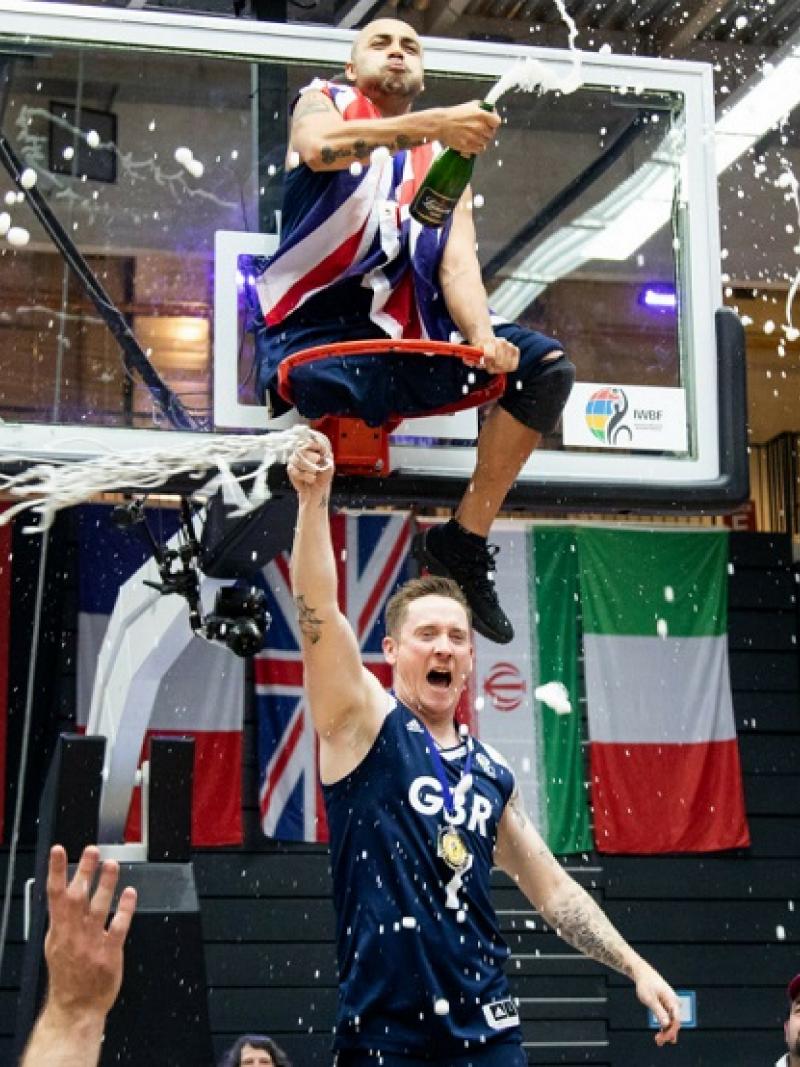 Great Britain players celebrate the Wheelchair Basketball World Championships title in Hamburg