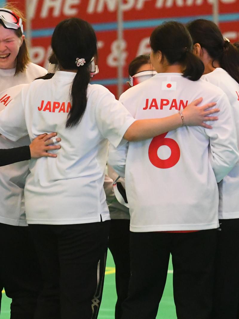 Japanese female goalball players embracing