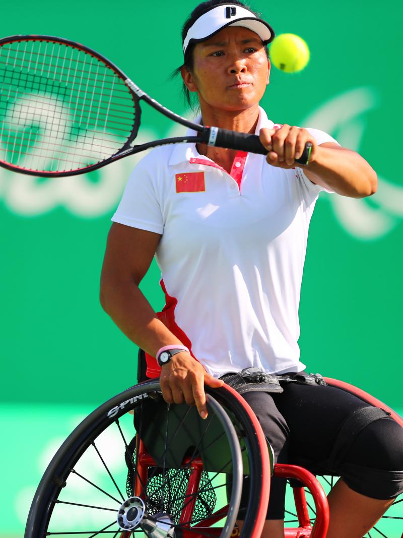 Chinese wheelchair tennis player Zhenzhen Zhu hitting a forehand