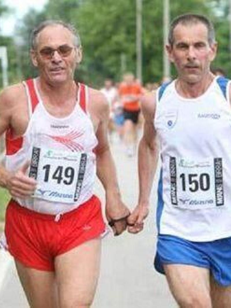 Blind marathon runner with his guide