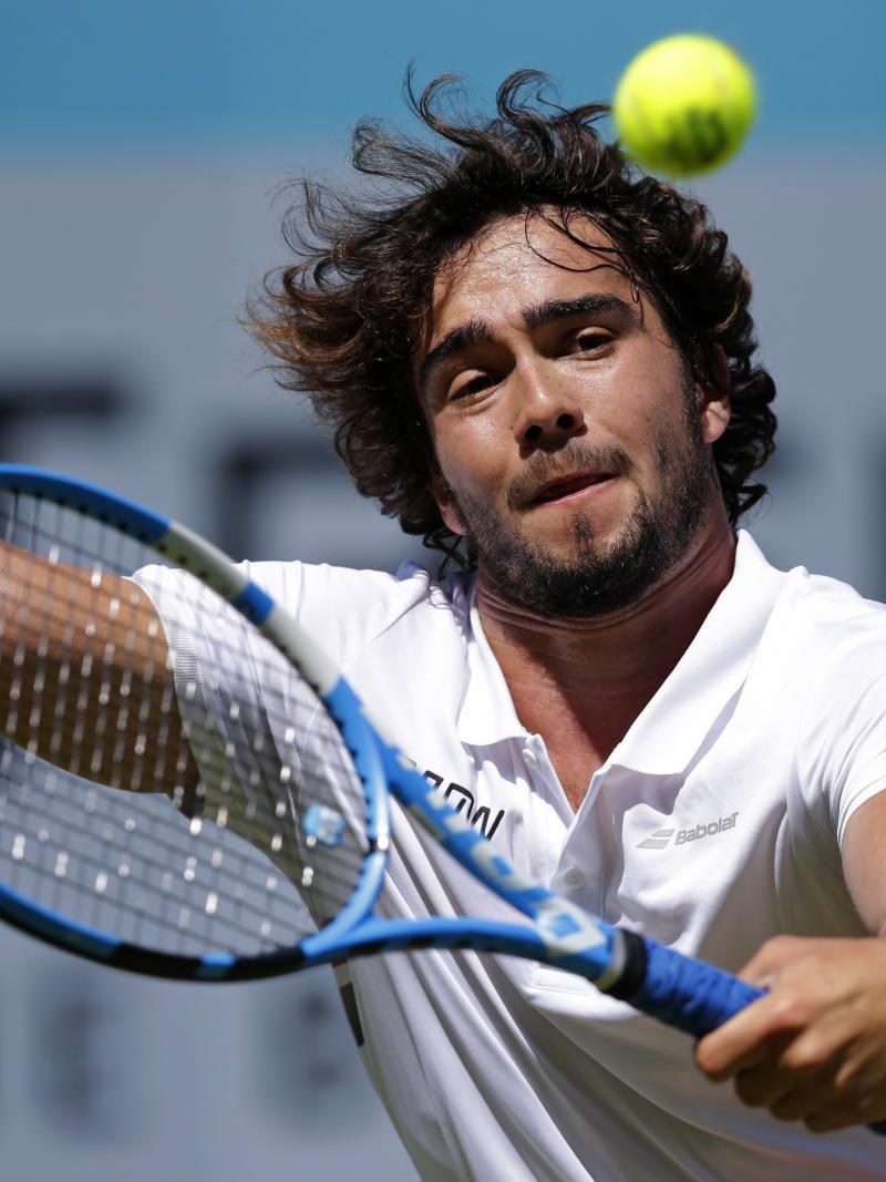 Daniel Caverzaschi hits the ball