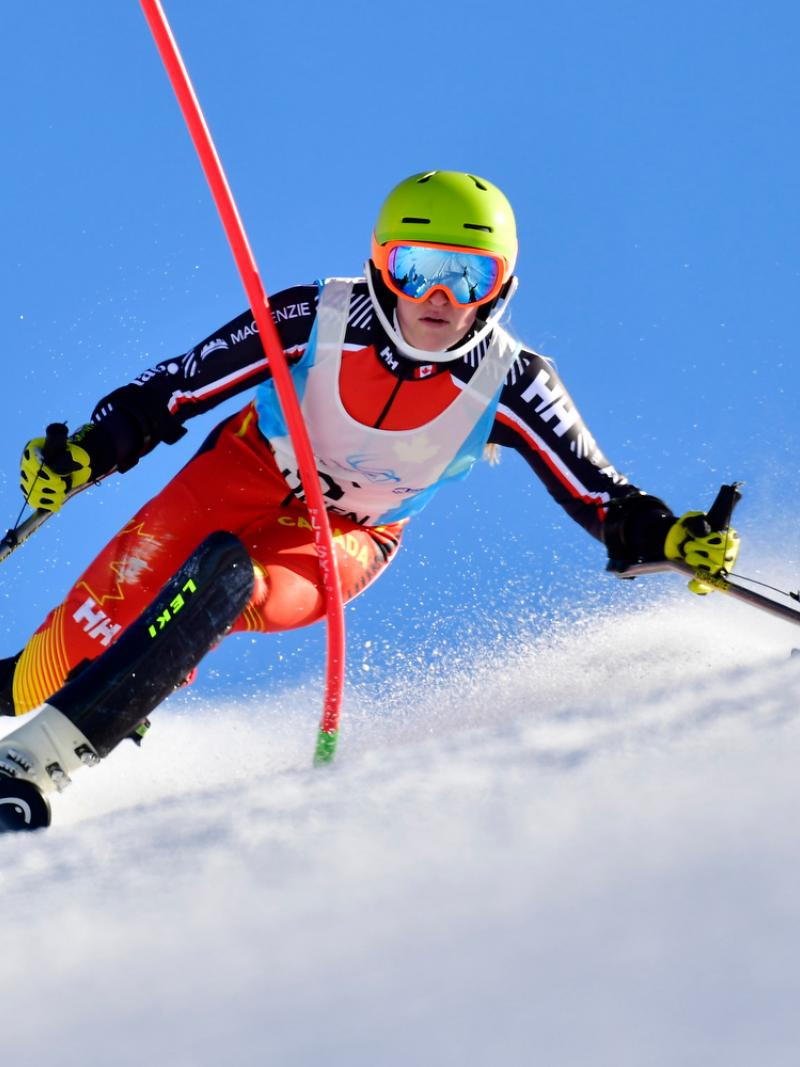 A female Para alpine skier competing on one leg