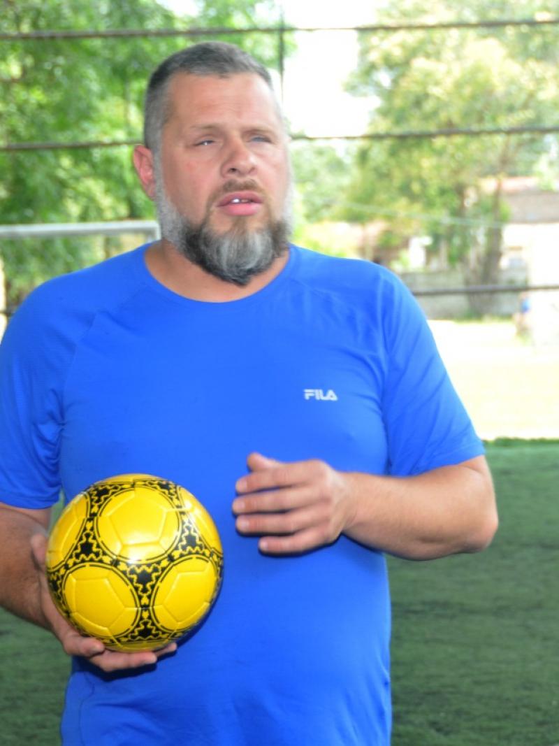 Diego Cerega holds a ball
