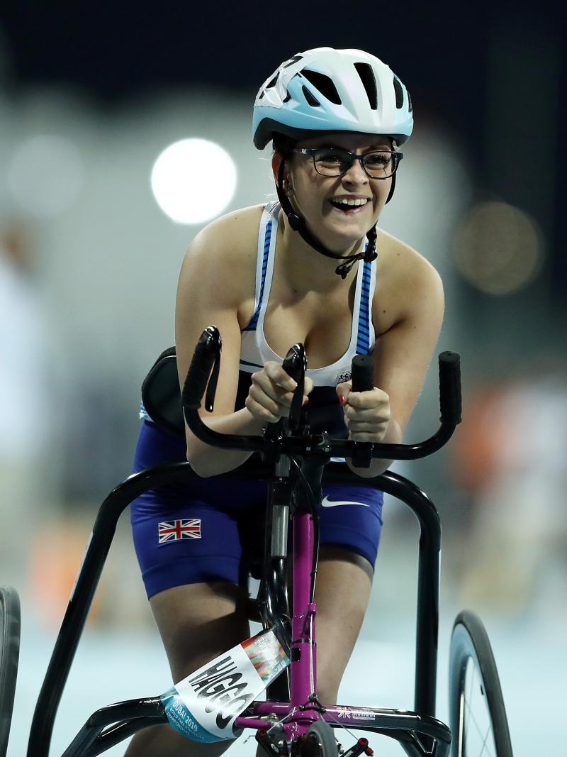 A female athlete competing using a RaceRunner