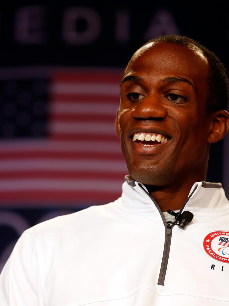 Lex Gillette smiles at the camera