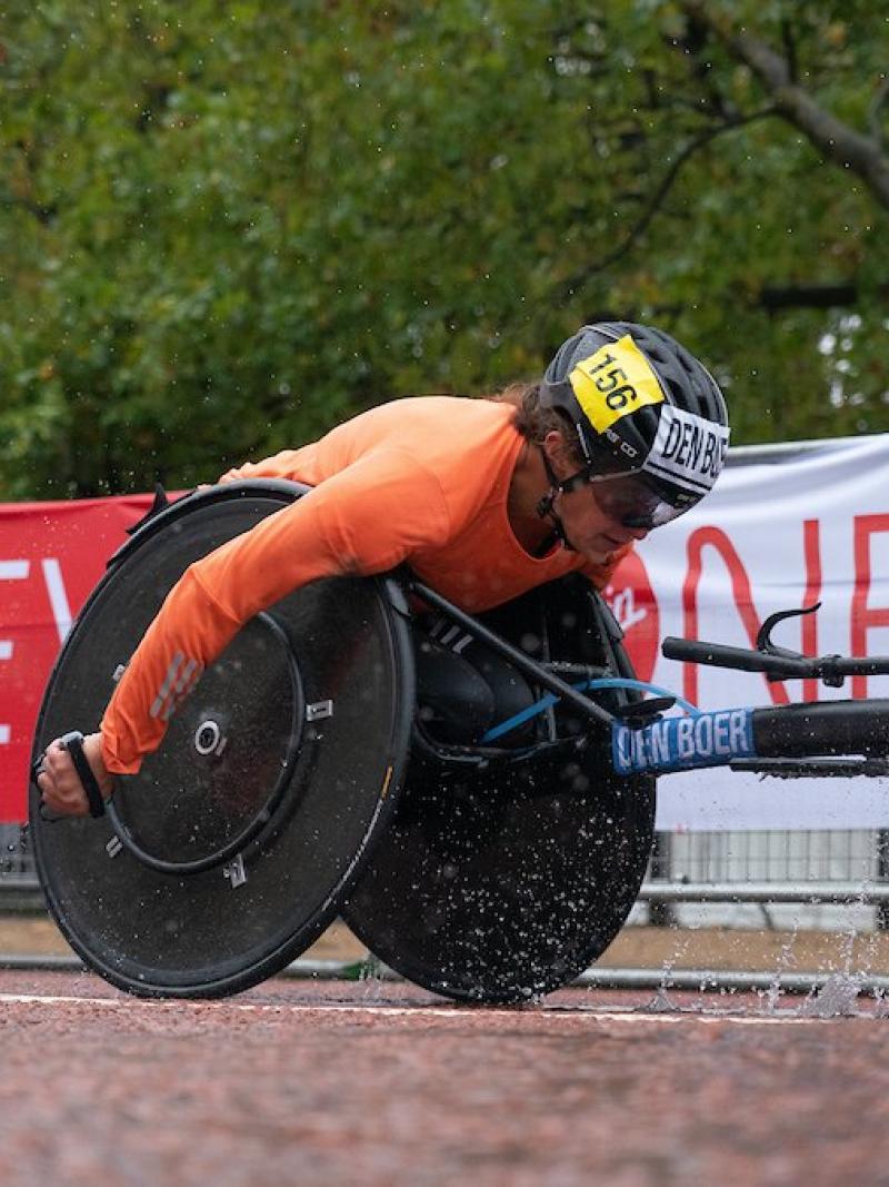 A female wheelchair racer ahead of another female wheelchair racer in the London Marathon