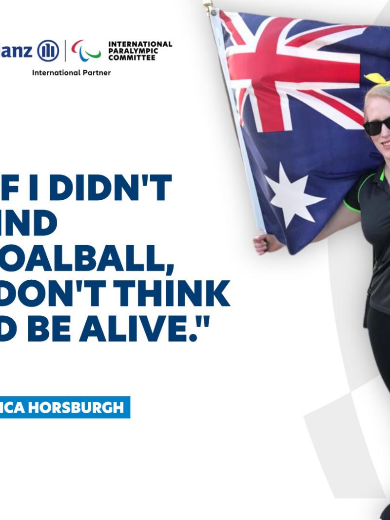 Vision impaired woman holding Australian flag with branded text on the side 