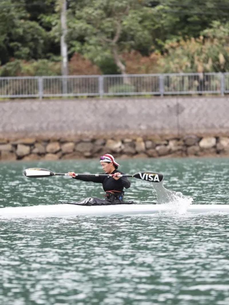 Japanese female canoeist on her kayak