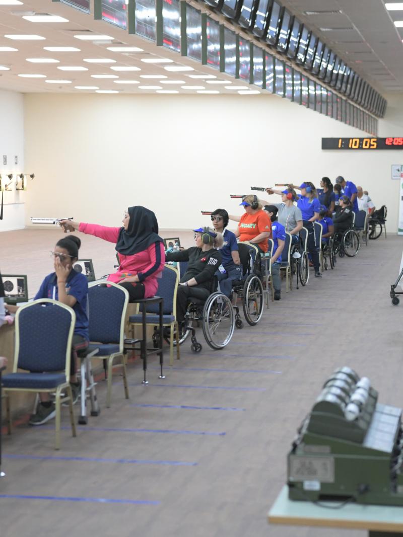 Sareh Javanmardi competing in the pistol event at the Al Ain World Cup 2021 alongside 12 other athletes 