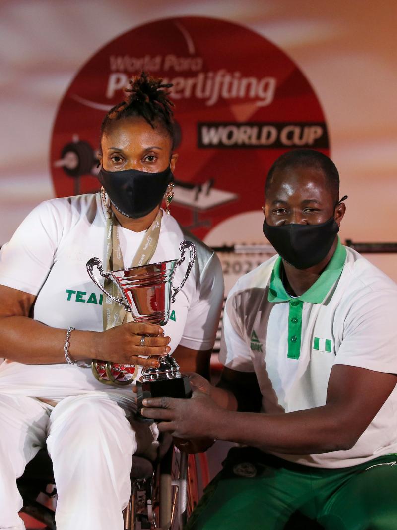 Nigeria team holding the World Cup trophy 