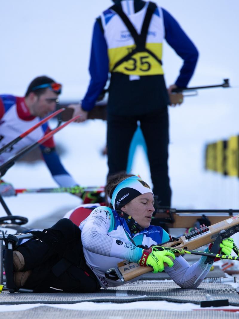 Anja Wicker preparing to shoot in the biathlon event
