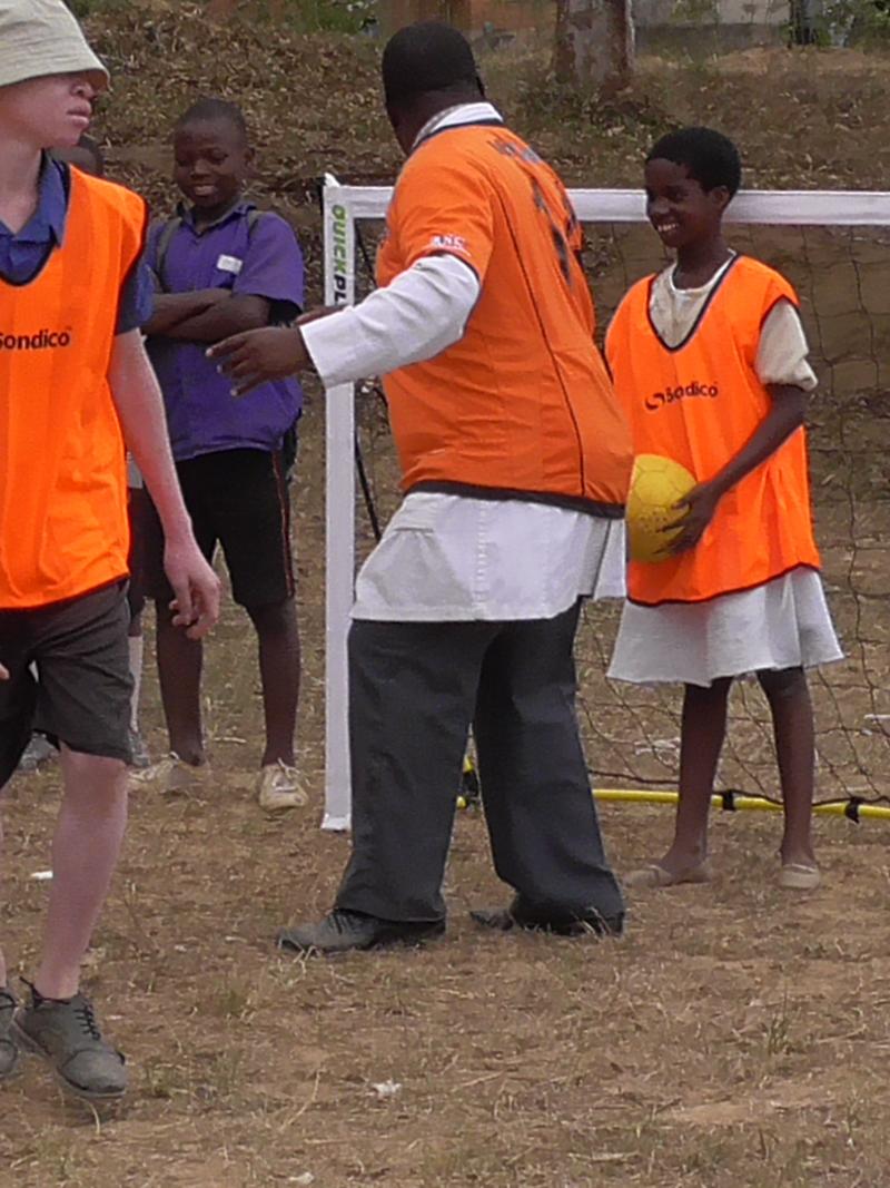 Kids in Malawi playing blind football