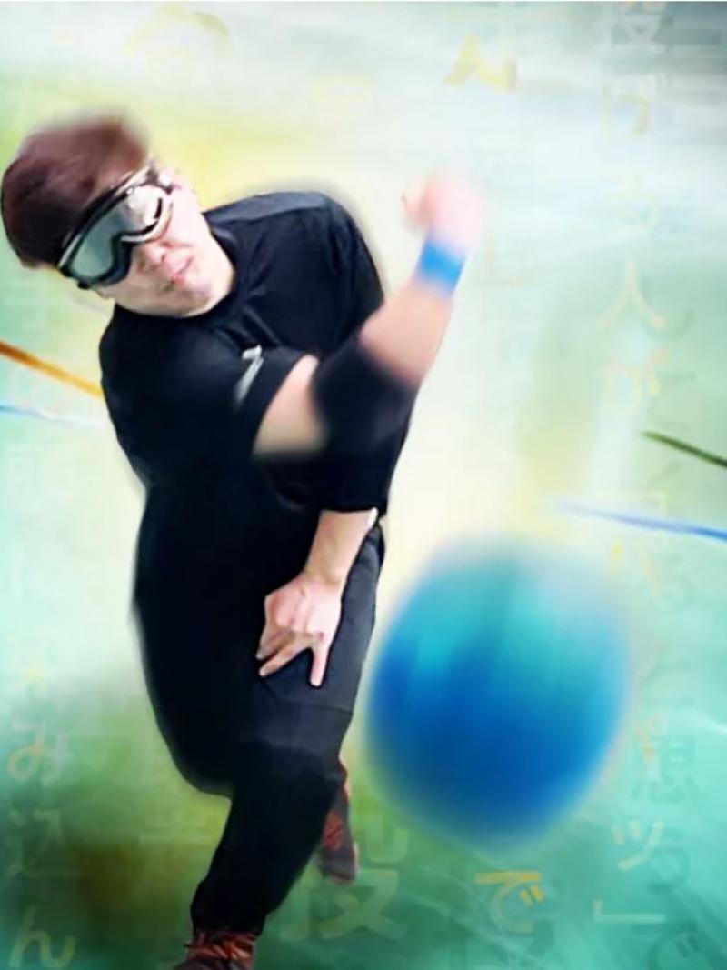 Goalball player Yuto Sano throwing the ball