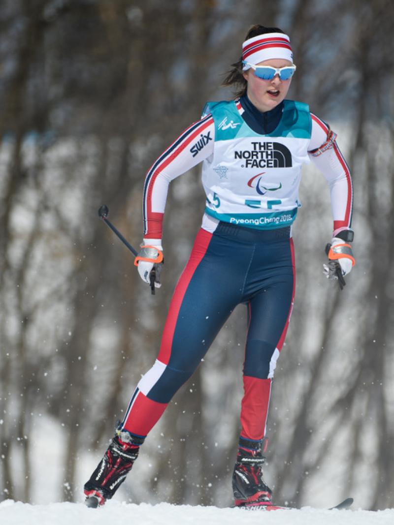 A female athlete competing in a Para cross-country event