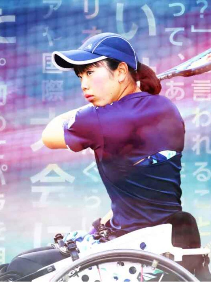 Japanese wheelchair tennis player hits backhand return