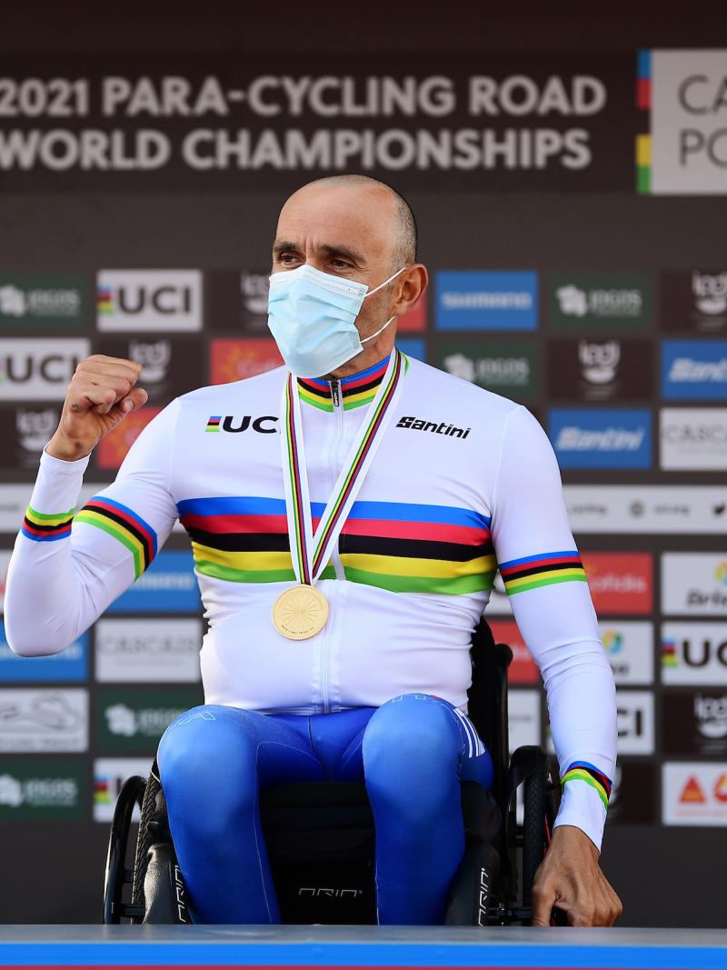 Italian Para cyclist Luca Mazzone in his wheelchair on the podium