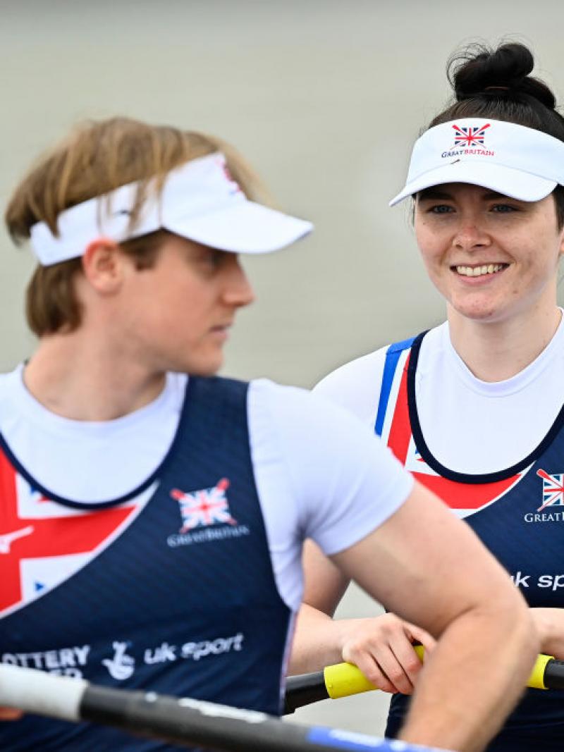 Double sculls crew with man and woman on boat