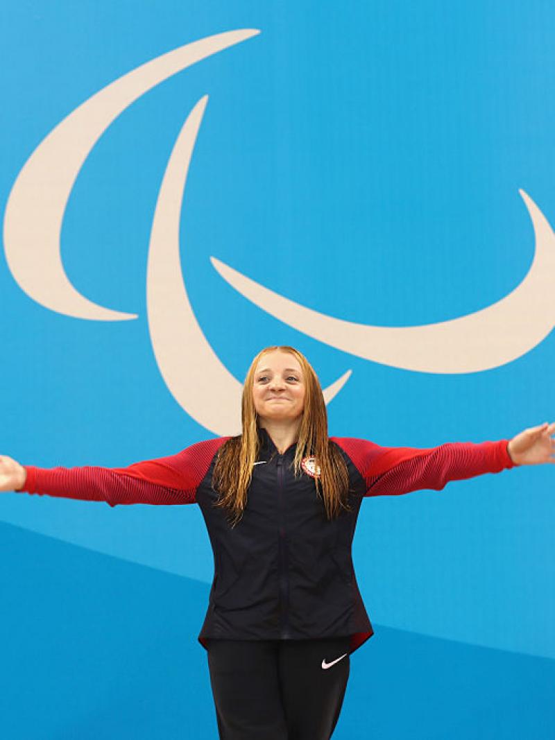USA's McKenzie Coan celebrates on the podium at the medal ceremony for the women's 100m Freestyle - S7 at Rio 2016 Paralympic Games.