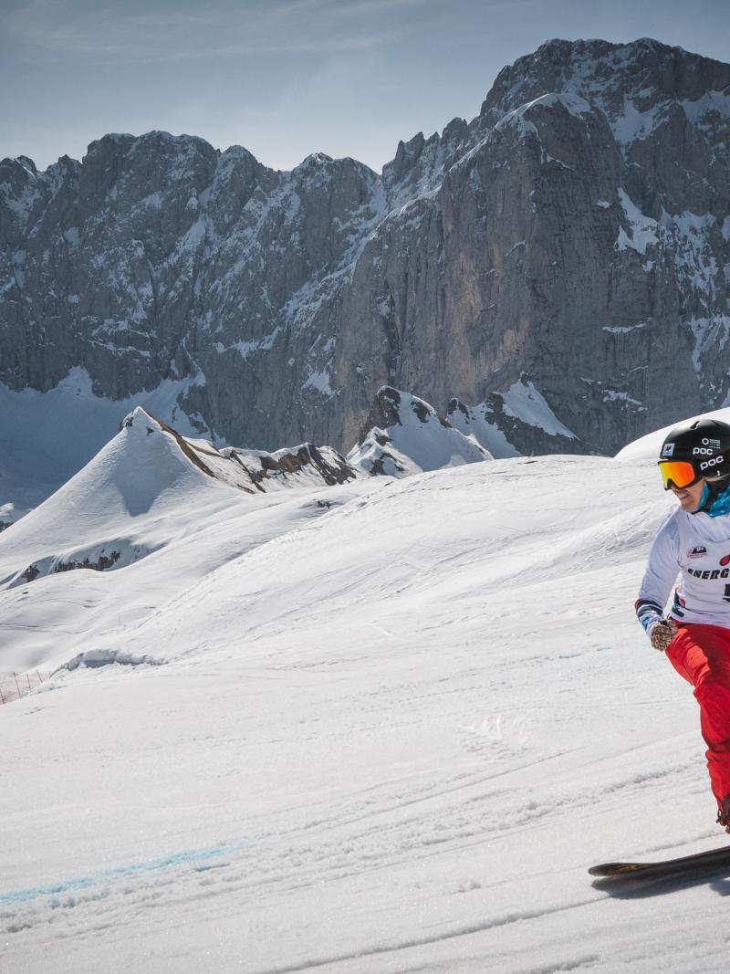 A female snowboarder in the snow