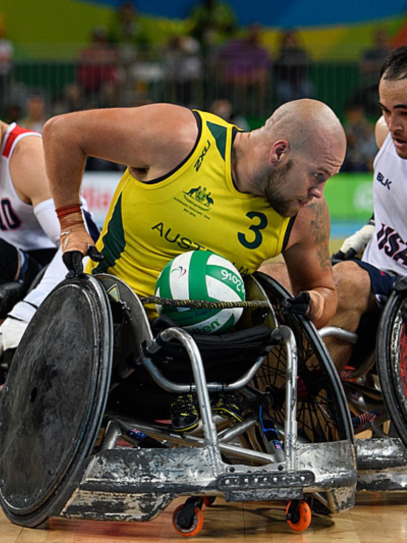 Ryley Batt tries to steer away from USA wheelchair rugby players