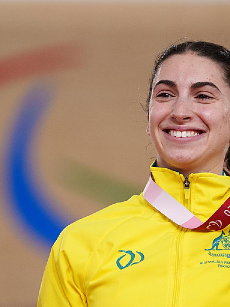Paige Greco displays her gold medal 