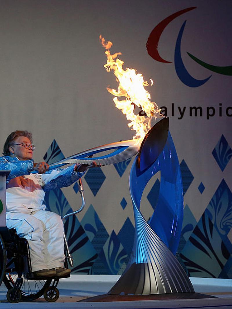 File photo of Paralympian Caz Walton lighting the torch during the Paralympic Heritage Flame lighting ceremony at Stoke Mandeville Stadium in England.