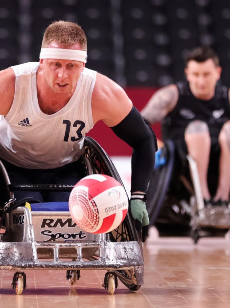 Phipps close up chasing the ball in his wheelchair