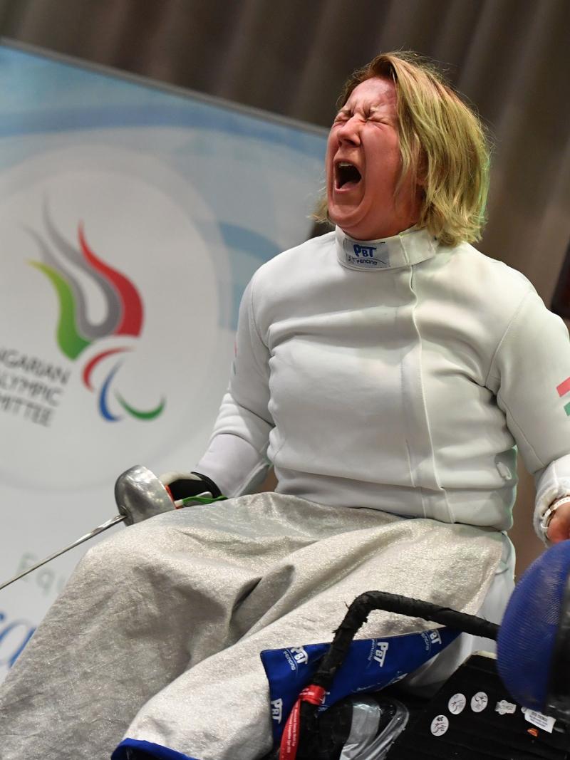 Hungarian wheelchair fencer Zsuzsanna Krajnyak celebrates