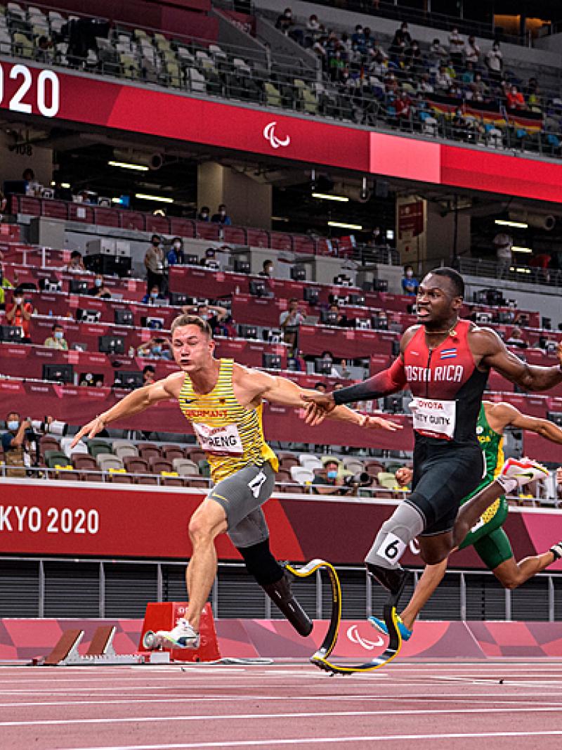 Amazing finish in the 100m with three male sprinters crossing the line about the same time