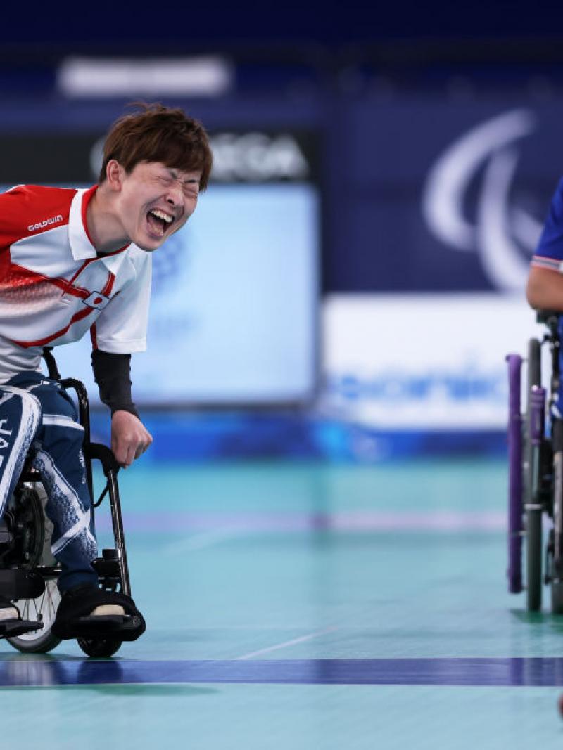 Hidetaka Sugimura of Japan shouts as he competes against Watcharaphon Vongsa in boccia