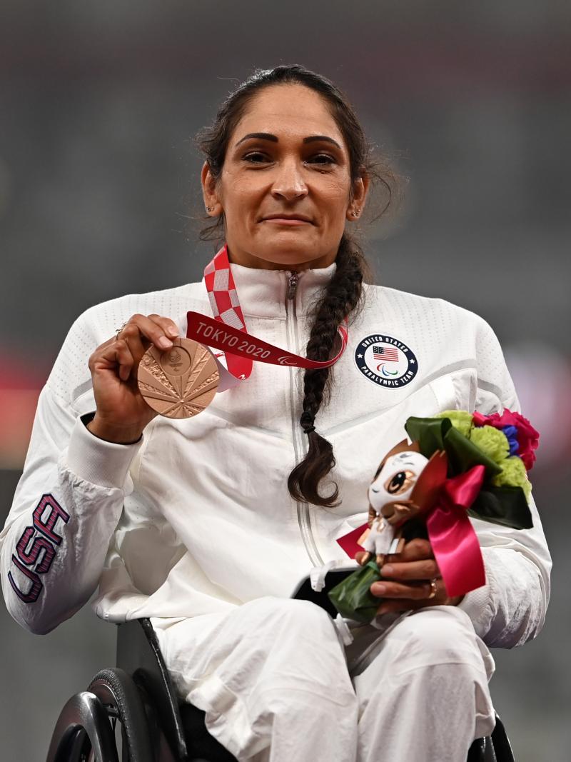 Cheri Madsen shows medal