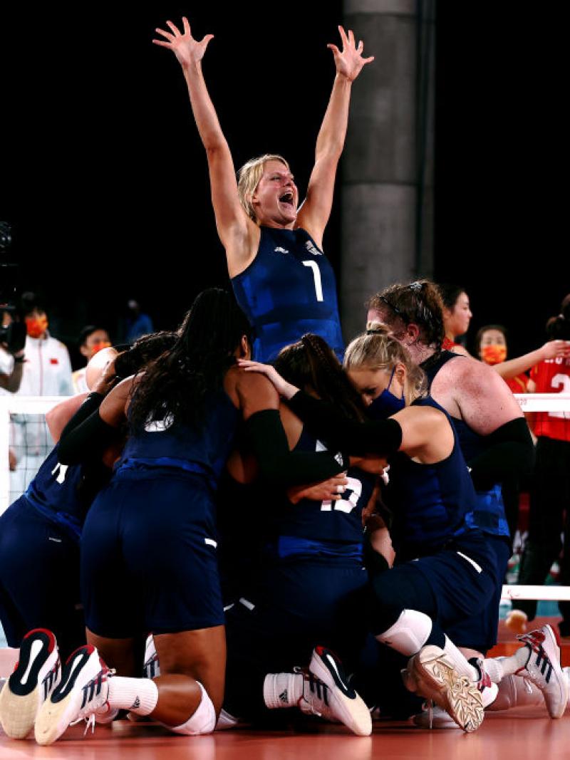 Team United States celebrate victory after winning the Women's Sitting Volleyball gold match against China at the Tokyo 2020 Paralympic Games.
