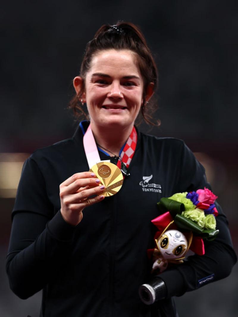 THE SMILE SAYS IT ALL: Holly Robinson of Team New Zealand poses with her gold medal after she competes in the women's javelin - F46 at the Tokyo 2020 Paralympic Games. 