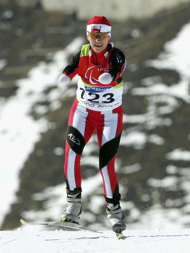 Polish Katarzyna Rogowiec smiles during the cross-country competition at Torino 2006