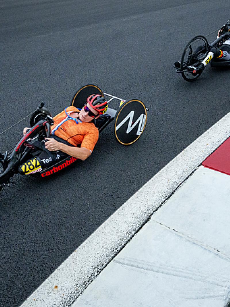 Two female handcyclists racing