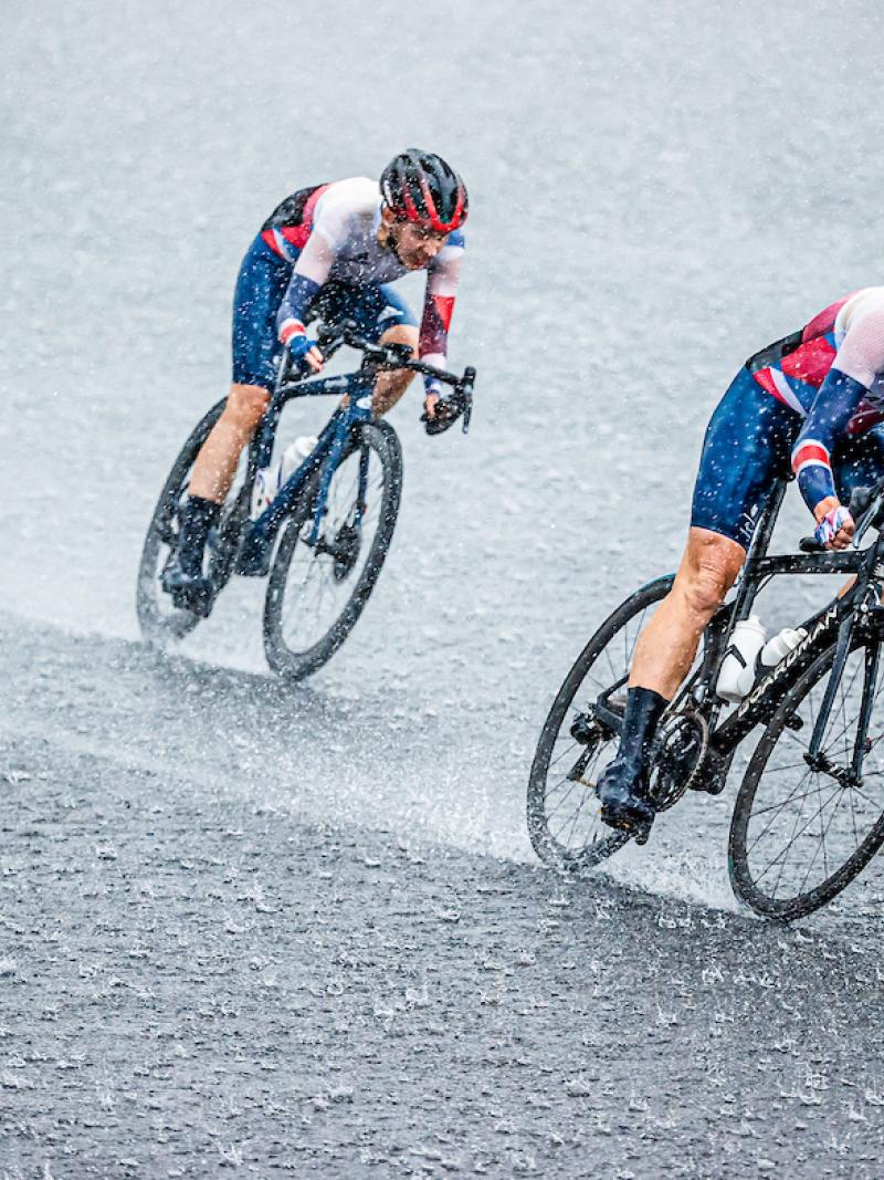 Cyclists battling heavy rain in the road race