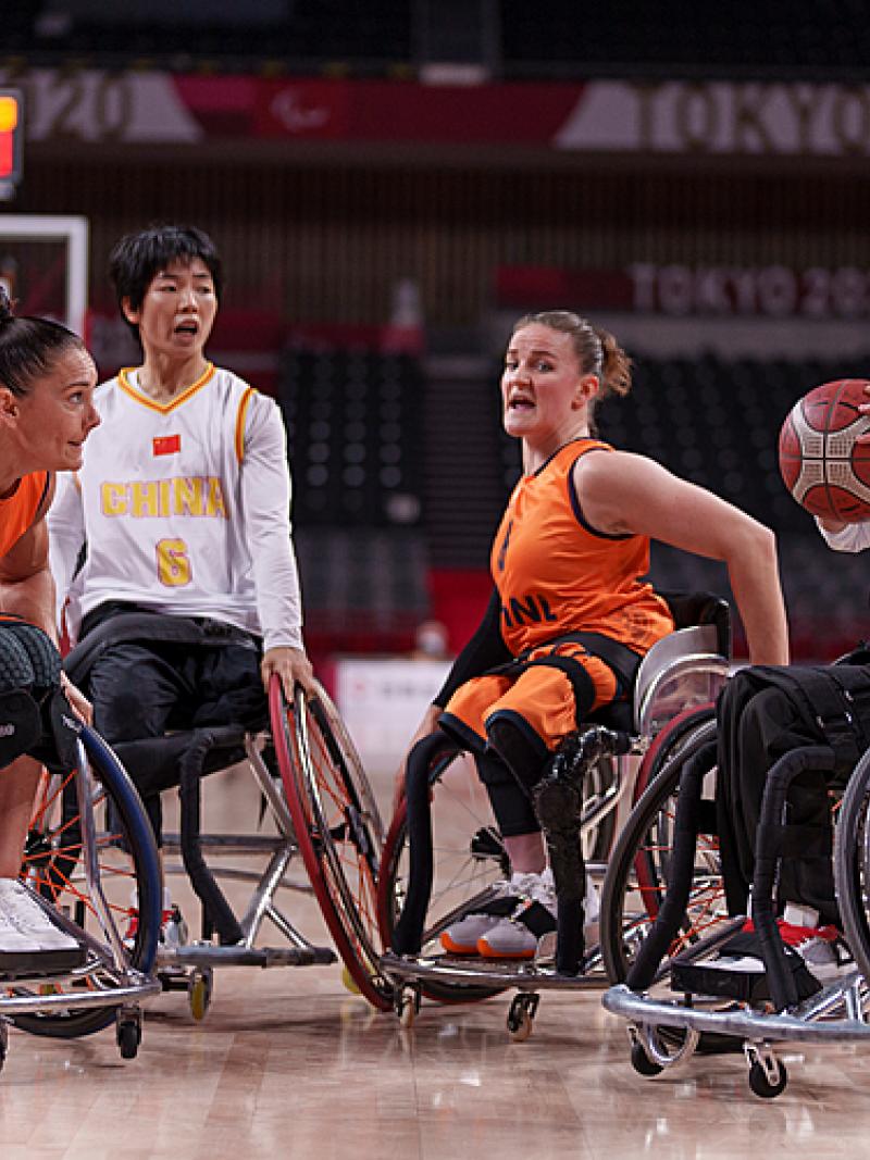 Chinese female basketball player prepares to shoot