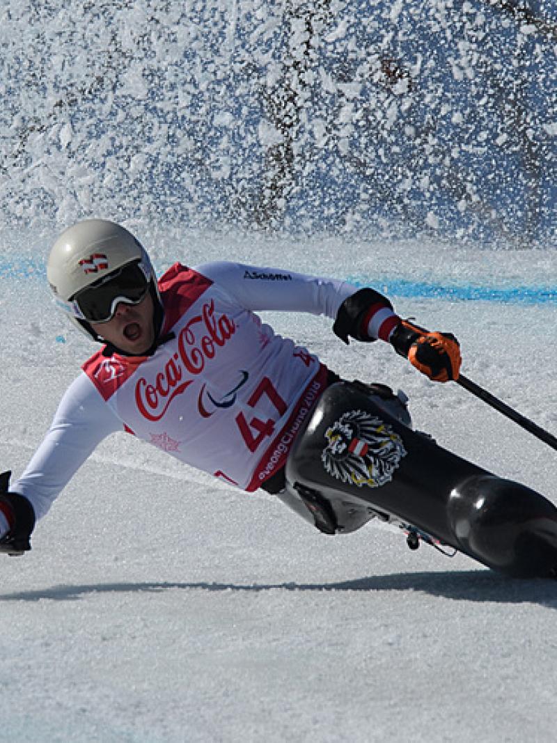 A male sit-skier competing at the PyeongChang 2018 Paralympic Winter Games