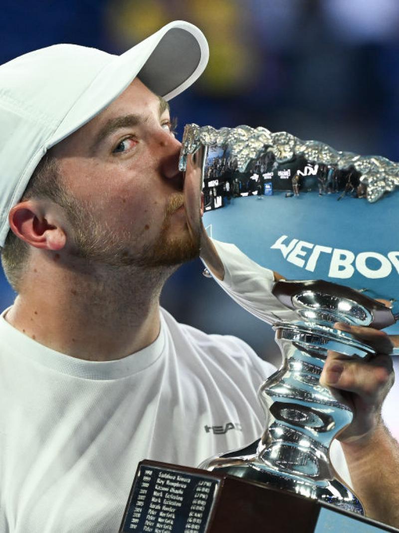 TASTE OF SUCCESS: Sam Schroder of Netherlands kisses the trophy after winning the Australian Open Quad Wheelchair Singles final against Dylan Alcott of Australia at Melbourne Park. 