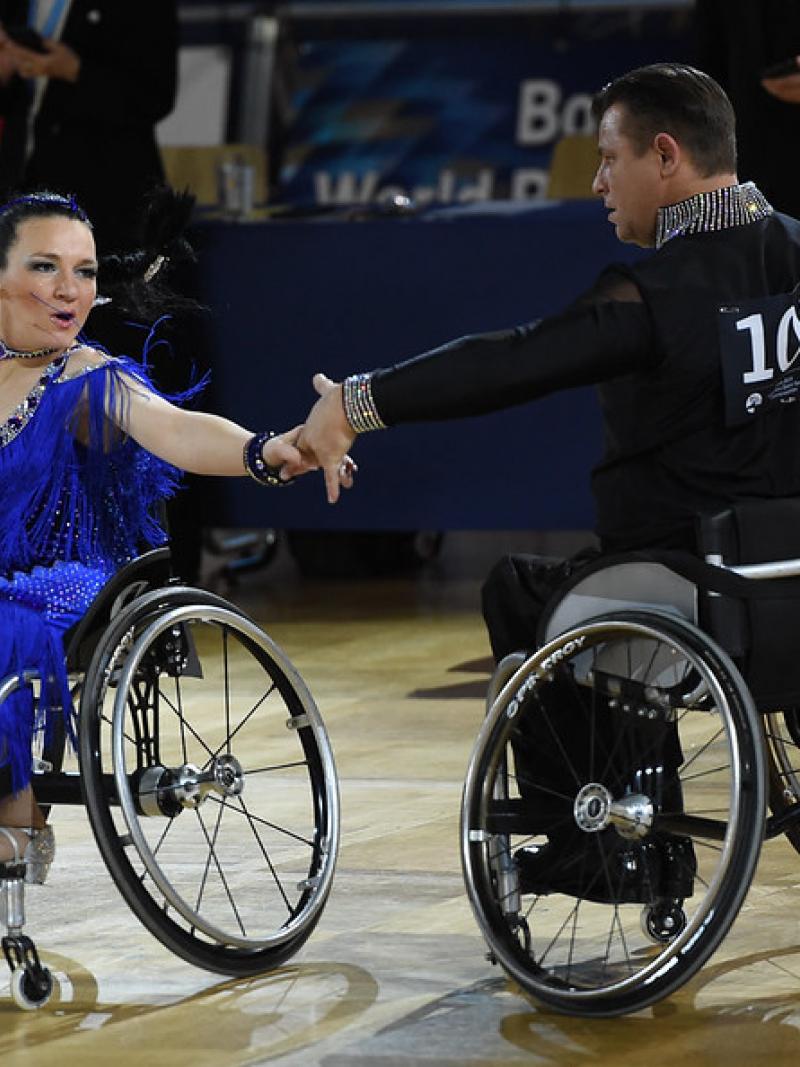 A couple of wheelchair dancers in a Para dance sport competition