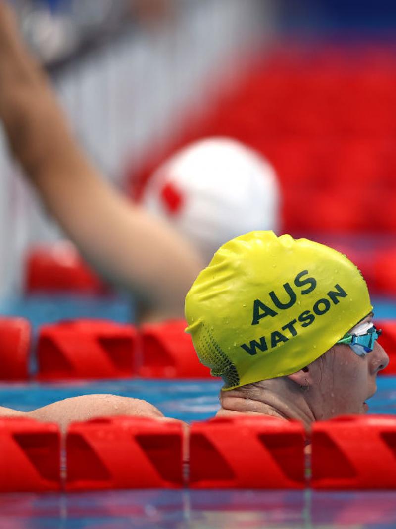 A female Para swimmer with an Australian swimming cap