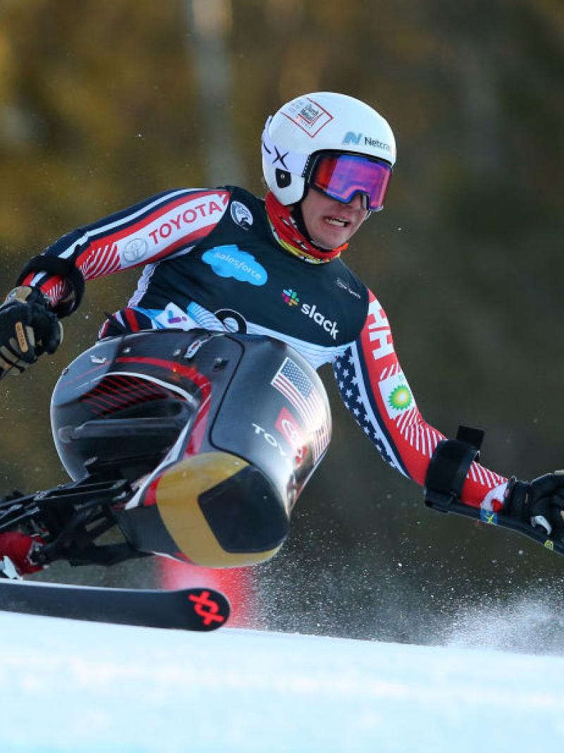 A male sit skier in a Para alpine skiing competition