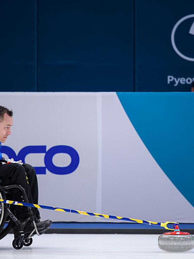 Ronny Person of Sweden in action during the PyeongChang 2018 wheelchair curling competition