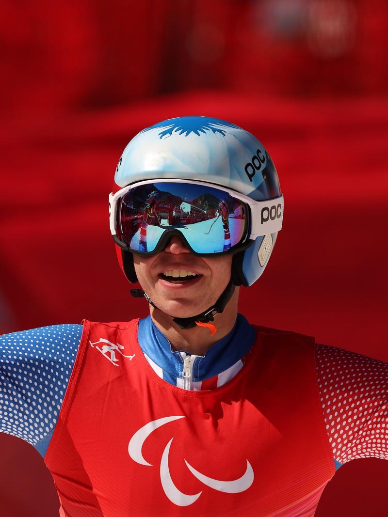 Arthur Bauchet smiles after his downhill victory