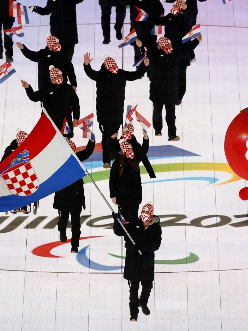 Bruno Bosnjak carrying the Croatian flag at the Opening Ceremony of Beijing 2022