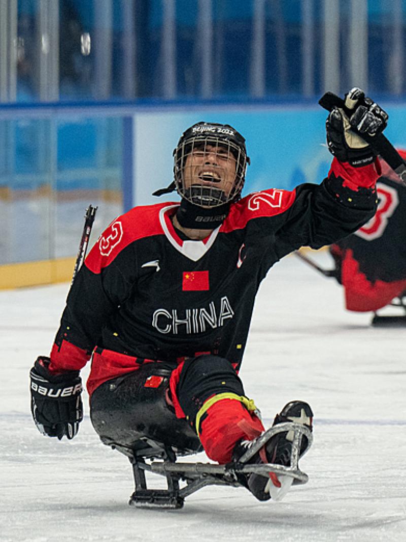 Chinese Para Ice Hockey player Cui Yutao celebrates after the victory against the Czech Republic
