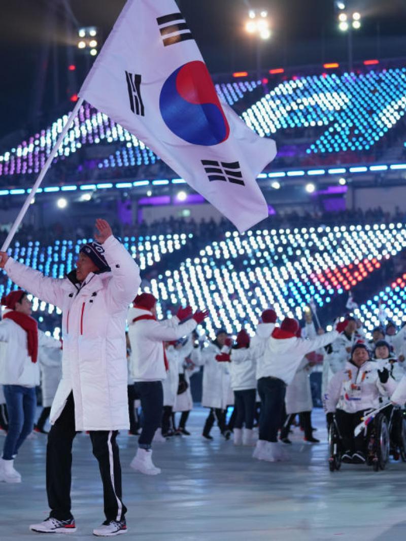 Flag bearer Sin Eui Hyun of South Korea leads the team during the Opening Ceremony of the PyeongChang 2018 Paralympic Winter Games.