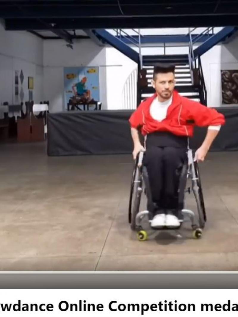 An image of a social media screen with a male wheelchair dancer