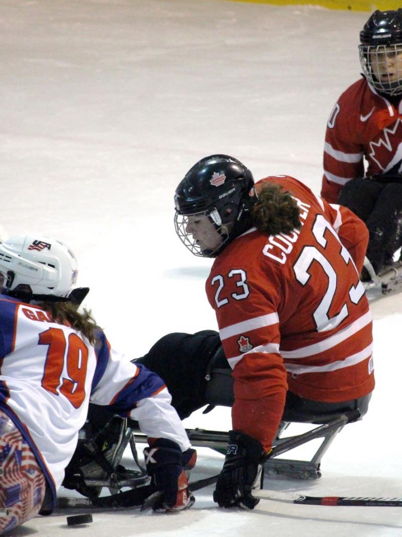 USA and Canadian players clash during a gold medal match in the second Women’s International Para Ice Hockey Cup held in Ostrava, Czech Republic.
