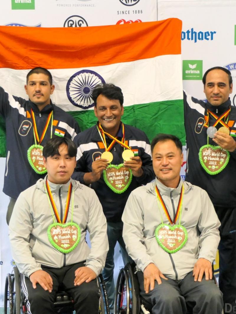  Teams celebrate their medals on podium